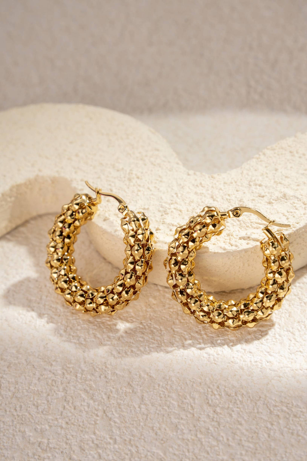 Boucles d’oreilles dorées acier inoxydable créoles tissées