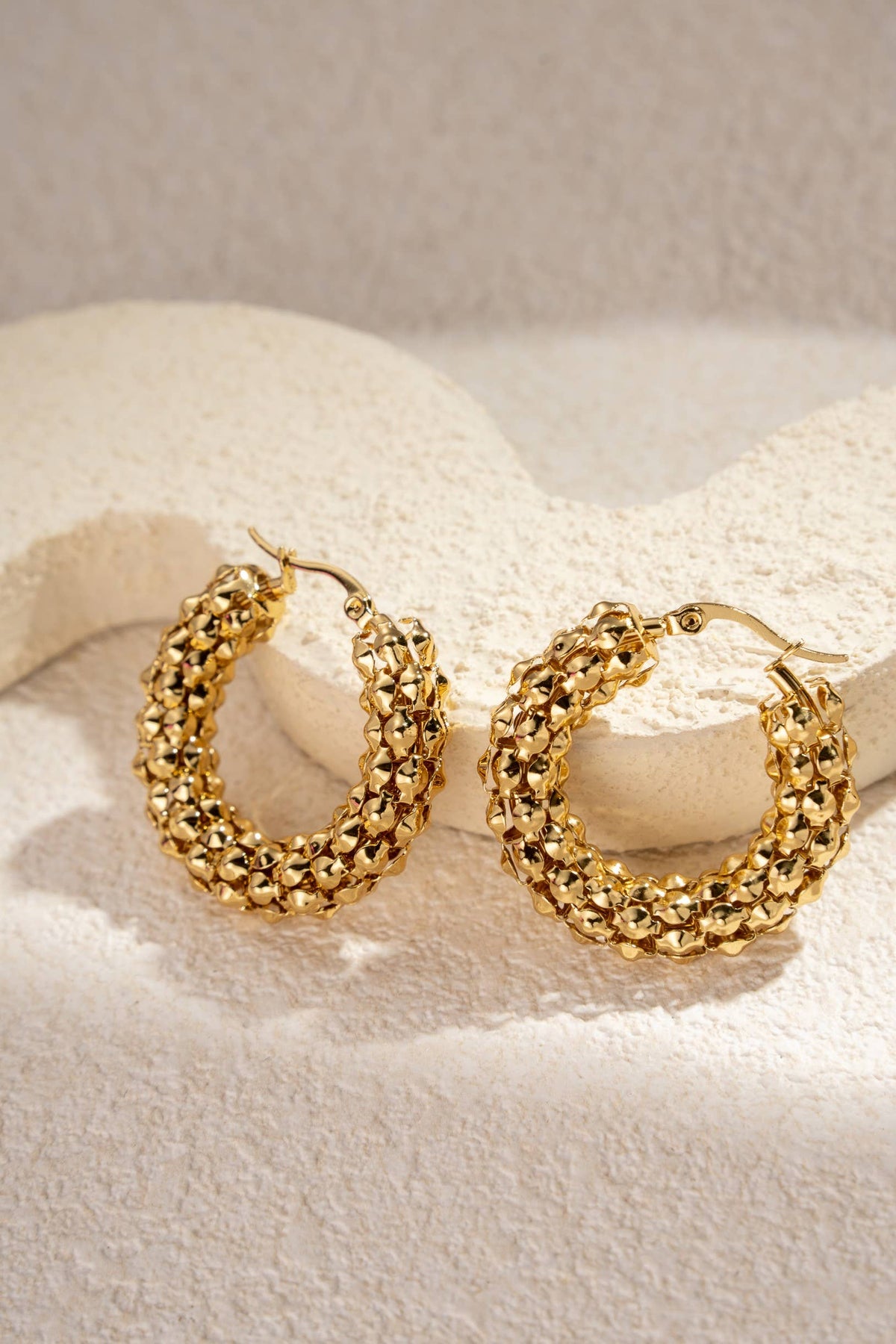Boucles d’oreilles dorées acier inoxydable créoles tissées