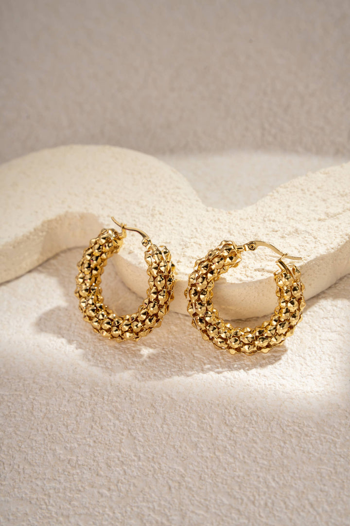 Boucles d’oreilles dorées acier inoxydable créoles tissées