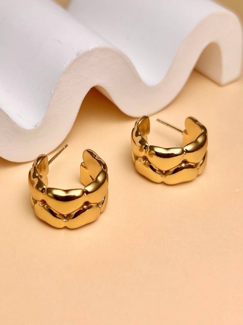 Boucle d'oreille creole avec petit coeur en acier inoxydable