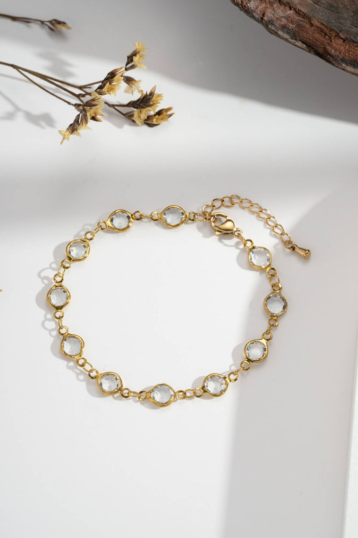 Bracelet doré acier inoxydable — pampilles cristal rondes