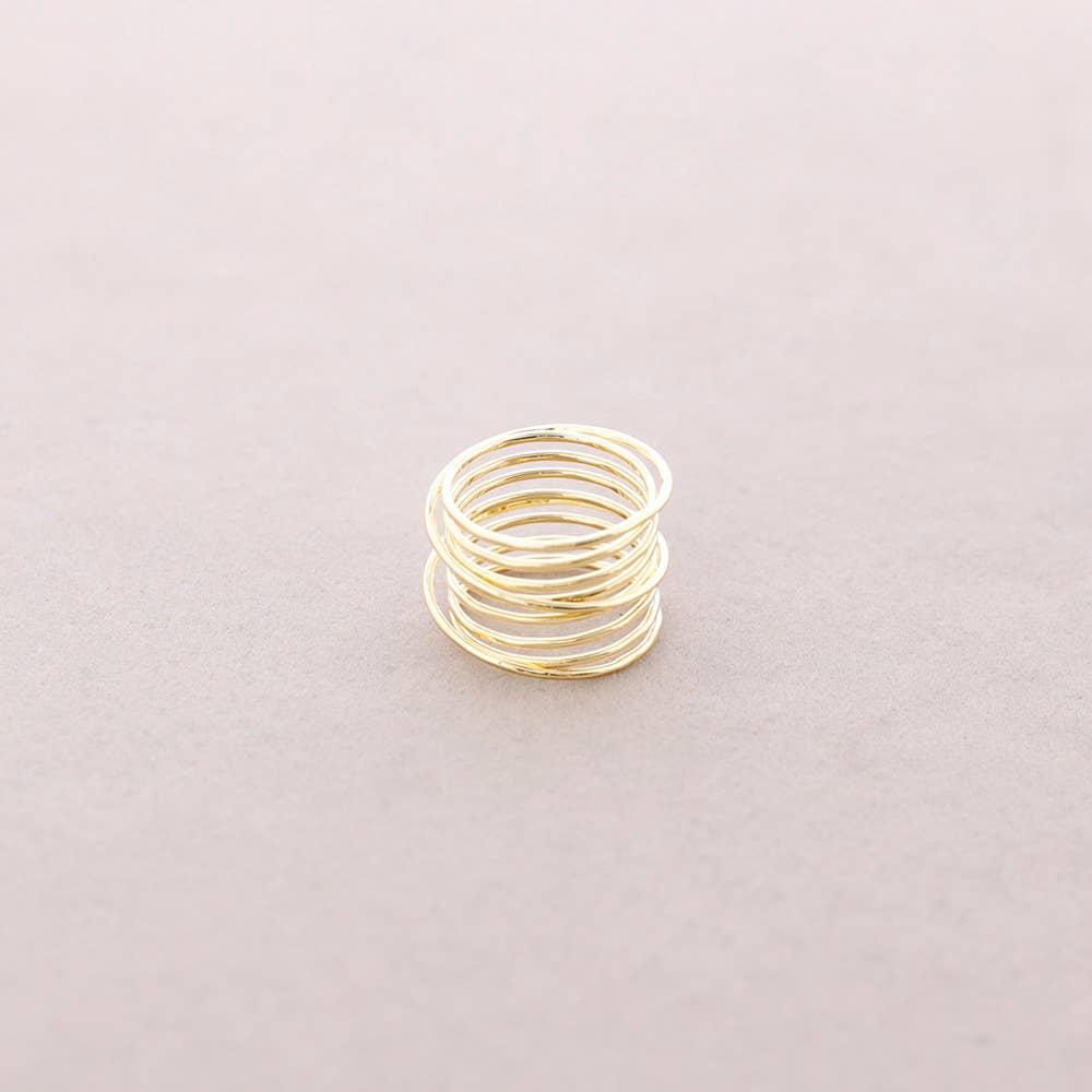 Bague à bretelles entrelacées: Or