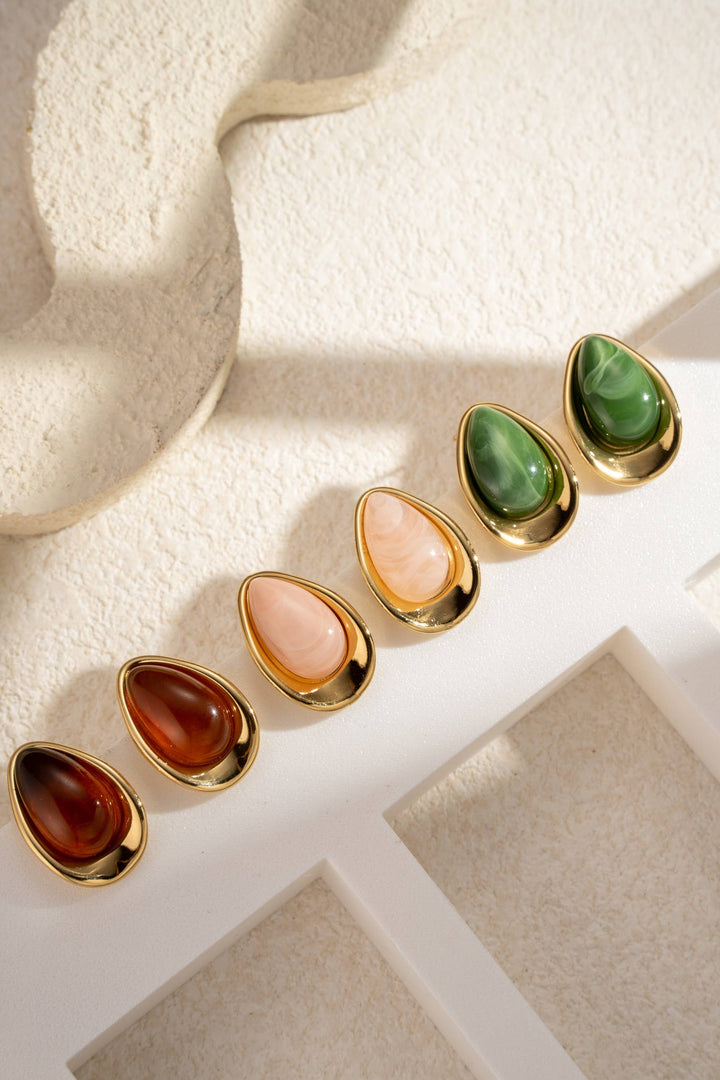 Boucles d’oreilles dorées ambre goutte chic résine élégante